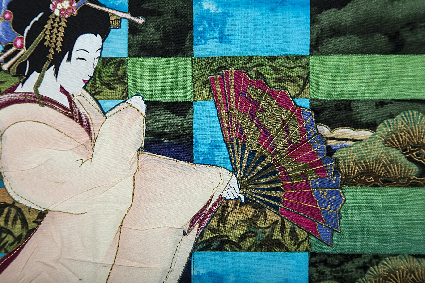 Geisha Glance textile art quilt by Janice M. Jones